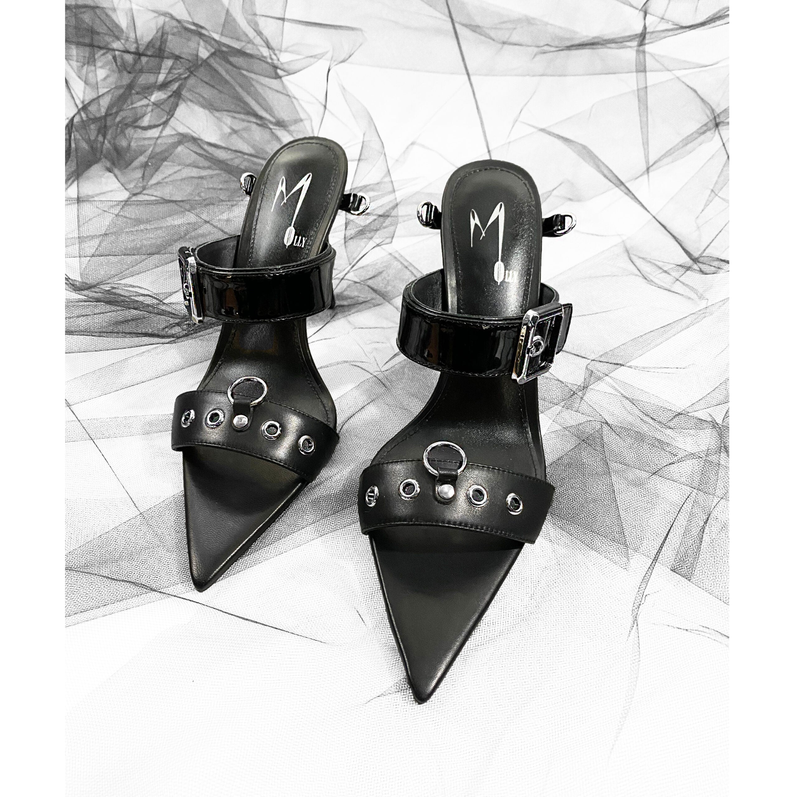 Black high heel leather stiletto shoes, Edgy luxury sandals with silver snaps and buckles, Front view